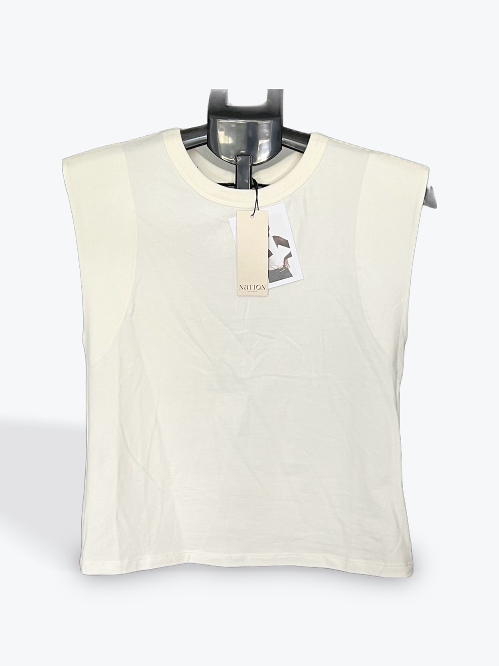 Sleeveless crewneck open back top in cream